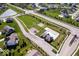 An aerial view of a beautiful community featuring a pool, playground, sport field and well-maintained green spaces at 16688 Bowesmont Dr, Fortville, IN 46040
