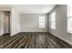 Bright bedroom with hardwood floors, large windows that let in plenty of natural light, and a spacious layout at 17372 Graley Pl, Westfield, IN 46074