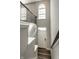 Bright foyer featuring high ceilings, an arched window above the front door, and a staircase with wrought iron railings at 17372 Graley Pl, Westfield, IN 46074