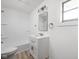 Bright bathroom featuring a shower-tub combo, modern vanity, and a large mirror at 207 Stephen Ct, Indianapolis, IN 46280