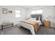 Cozy bedroom with soft carpet, natural light, and stylish furnishings at 207 Stephen Ct, Indianapolis, IN 46280