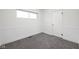 Spare bedroom with wainscoting and neutral carpet at 207 Stephen Ct, Indianapolis, IN 46280