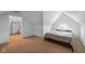 This bedroom features neutral carpet, a closet area, natural light, and neutral paint at 218 Urban St, Danville, IN 46122