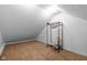 This closet area features neutral carpet, neutral paint, and a clothing rack at 218 Urban St, Danville, IN 46122