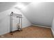 This closet area features neutral carpet, neutral paint, and a clothing rack at 218 Urban St, Danville, IN 46122