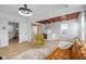 Inviting living room with a fireplace, french doors and light-colored laminate floors at 218 Urban St, Danville, IN 46122