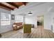 Cozy living room with wood ceilings, large windows, and comfortable seating at 218 Urban St, Danville, IN 46122