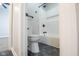 Bathroom featuring modern fixtures, tile flooring, and an alcove tub shower at 221 Eastern Ave, Indianapolis, IN 46201