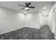 This bedroom features a modern ceiling fan and stylish dark marbled flooring at 221 Eastern Ave, Indianapolis, IN 46201