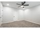 Bedroom featuring neutral walls, carpet, and a ceiling fan at 221 Eastern Ave, Indianapolis, IN 46201