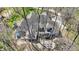 Aerial view showcasing backyard patio with outdoor furniture and surrounding trees at 23219 Marin Dr, Cicero, IN 46034