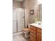 Bathroom featuring a walk in shower, toilet and vanity at 23219 Marin Dr, Cicero, IN 46034
