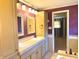 A Primary bath features double sinks, a built-in cabinet, and a tiled floor at 243 E Benton St, Alexandria, IN 46001