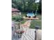 Backyard featuring an in-ground pool, deck with lounge chairs, and a cozy gazebo at 251 E South St, Franklin, IN 46131