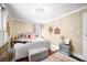 This bedroom features a comfortable bed and a decorative chandelier for a relaxing ambiance at 251 E South St, Franklin, IN 46131
