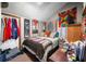 Cozy bedroom with eclectic decor, comfortable queen bed, and hardwood flooring at 251 E South St, Franklin, IN 46131