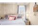Serene bedroom featuring a comfortable bed, neutral tones, and natural light at 251 E South St, Franklin, IN 46131