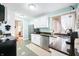 Kitchen with stainless steel appliances, granite countertops, sink and backsplash at 251 E South St, Franklin, IN 46131