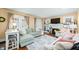 Comfortable living room with a fireplace, hardwood floors, and ample seating at 251 E South St, Franklin, IN 46131