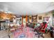 Comfortable living room features a vintage rug, eclectic decor, and plenty of natural light at 251 E South St, Franklin, IN 46131