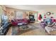 Comfortable living room with a large patterned rug and a relaxing seating area at 3024 N Huber St, Indianapolis, IN 46226