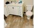 Bathroom featuring wood floors and a toilet at 3126 Newhart St, Indianapolis, IN 46217