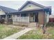Classic home featuring a welcoming front porch and well-defined architectural design at 330 N Beville Ave, Indianapolis, IN 46201
