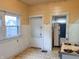 Kitchen with window and doorway leading to adjacent room at 330 N Beville Ave, Indianapolis, IN 46201