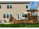 Exterior of home with a wooden deck featuring a pergola and an umbrella at 3393 Paisley Pointe, Whitestown, IN 46075