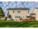 Exterior of home with a well-maintained backyard, hot tub, and wooden deck with pergola at 3393 Paisley Pointe, Whitestown, IN 46075