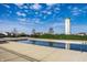 Community pool on a sunny day with a clear blue sky and cloudscape at 3393 Paisley Pointe, Whitestown, IN 46075