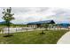 Community splash pad featuring various water elements, covered seating, and lush green landscaping, providing a recreational space at 3393 Paisley Pointe, Whitestown, IN 46075