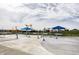 Modern splash pad featuring whimsical water features, seating, and landscaping for community fun and recreation at 3393 Paisley Pointe, Whitestown, IN 46075