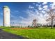 Community playground and park with a silo, swings, and play structures at 3393 Paisley Pointe, Whitestown, IN 46075