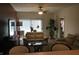 Cozy living room featuring comfortable seating, a ceiling fan, and a sliding glass door for natural light and views at 3643 Reflections Ln # 5, Indianapolis, IN 46214