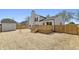 Expansive backyard featuring a well-maintained deck and functional shed at 4057 Knollwood Ave, Franklin, IN 46131