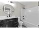 Clean bathroom featuring updated vanity, updated fixtures, and bathtub at 4057 Knollwood Ave, Franklin, IN 46131