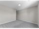 Empty bedroom with gray carpet, neutral paint, and flush mount lighting at 4057 Knollwood Ave, Franklin, IN 46131