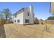 Backyard view of the home showcasing the deck and outdoor living spaces at 4057 Knollwood Ave, Franklin, IN 46131