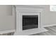 A detailed close-up of a modern-styled, decorative fireplace at 4057 Knollwood Ave, Franklin, IN 46131
