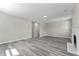 Spacious living room with modern fireplace and stylish neutral-colored paint at 4057 Knollwood Ave, Franklin, IN 46131