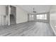 Well-lit living room showcasing the open floor plan with stairs leading to the upper level at 4057 Knollwood Ave, Franklin, IN 46131