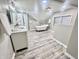 Spacious bathroom featuring a modern vanity, luxurious clawfoot tub, and separate shower, creating a spa-like retreat at 4205 Rookwood Ave, Indianapolis, IN 46208