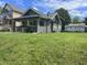 Charming single-story home with a well-manicured lawn and inviting front porch at 4205 Rookwood Ave, Indianapolis, IN 46208