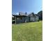 Charming two-story home with landscaped yard and lovely lawn at 4205 Rookwood Ave, Indianapolis, IN 46208
