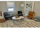 Bright living room with stylish furniture and decor at 4205 Rookwood Ave, Indianapolis, IN 46208