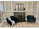 Cozy living room with a fireplace and comfortable seating at 4205 Rookwood Ave, Indianapolis, IN 46208