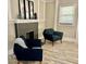 Cozy living room with a fireplace and comfortable seating at 4205 Rookwood Ave, Indianapolis, IN 46208