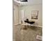 Home office space with modern black desk, light tan chairs, and neutral decor at 4205 Rookwood Ave, Indianapolis, IN 46208