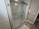 Modern bathroom featuring a glass-enclosed shower with tile surround and sleek fixtures at 4205 Rookwood Ave, Indianapolis, IN 46208